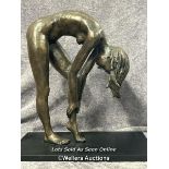A large bronze effect resin study of a nude female on wooden base, numbered 5/95, 50cm high / AN1