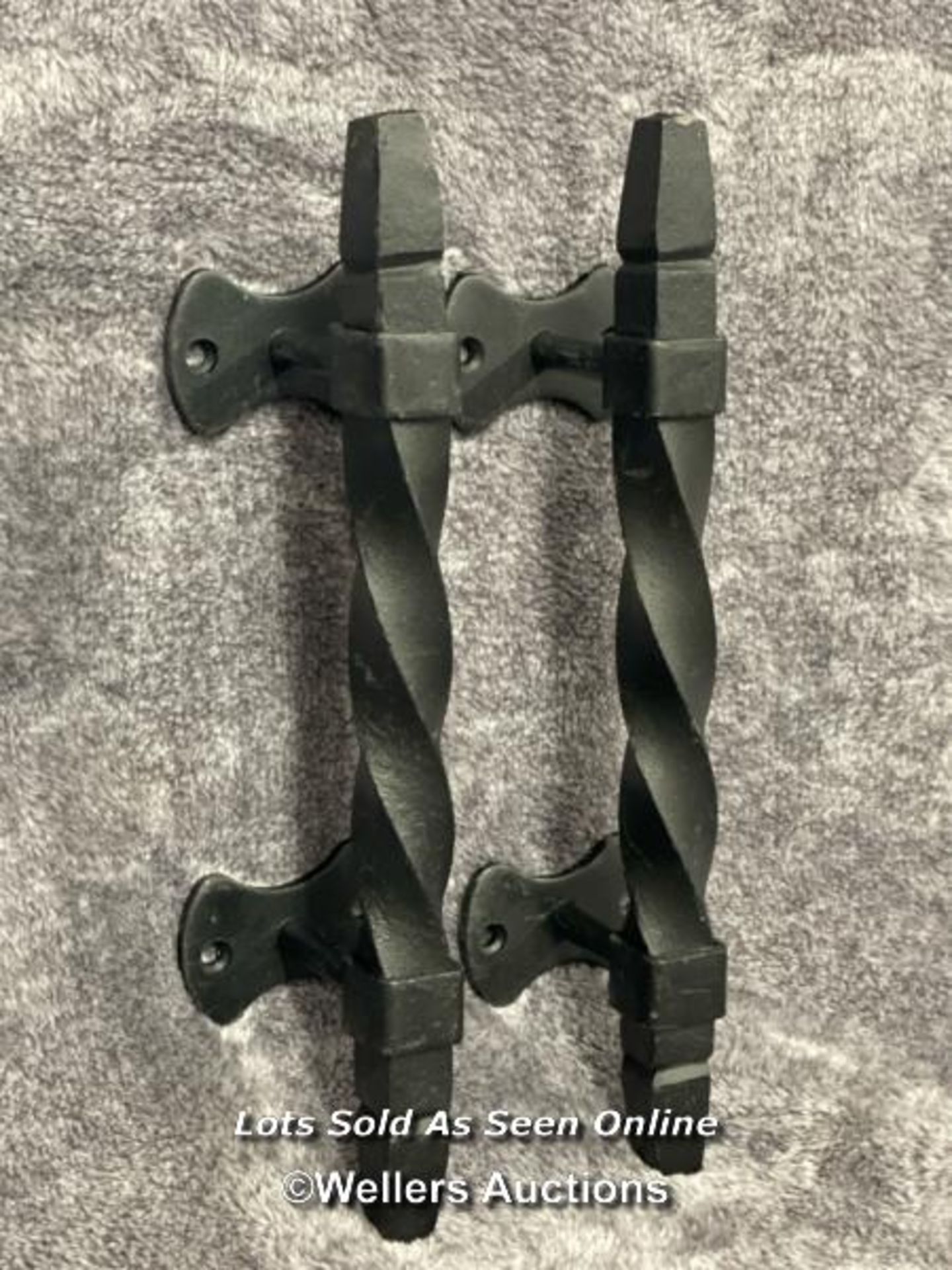 A pair of iron door pull handles in twist design, 28cm long - Image 2 of 3