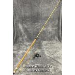 Vintage fibreglass fishing rod with cork handle, 265cm long with a Prince regent reel / AN16