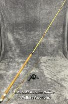 Vintage fibreglass fishing rod with cork handle, 265cm long with a Prince regent reel / AN16