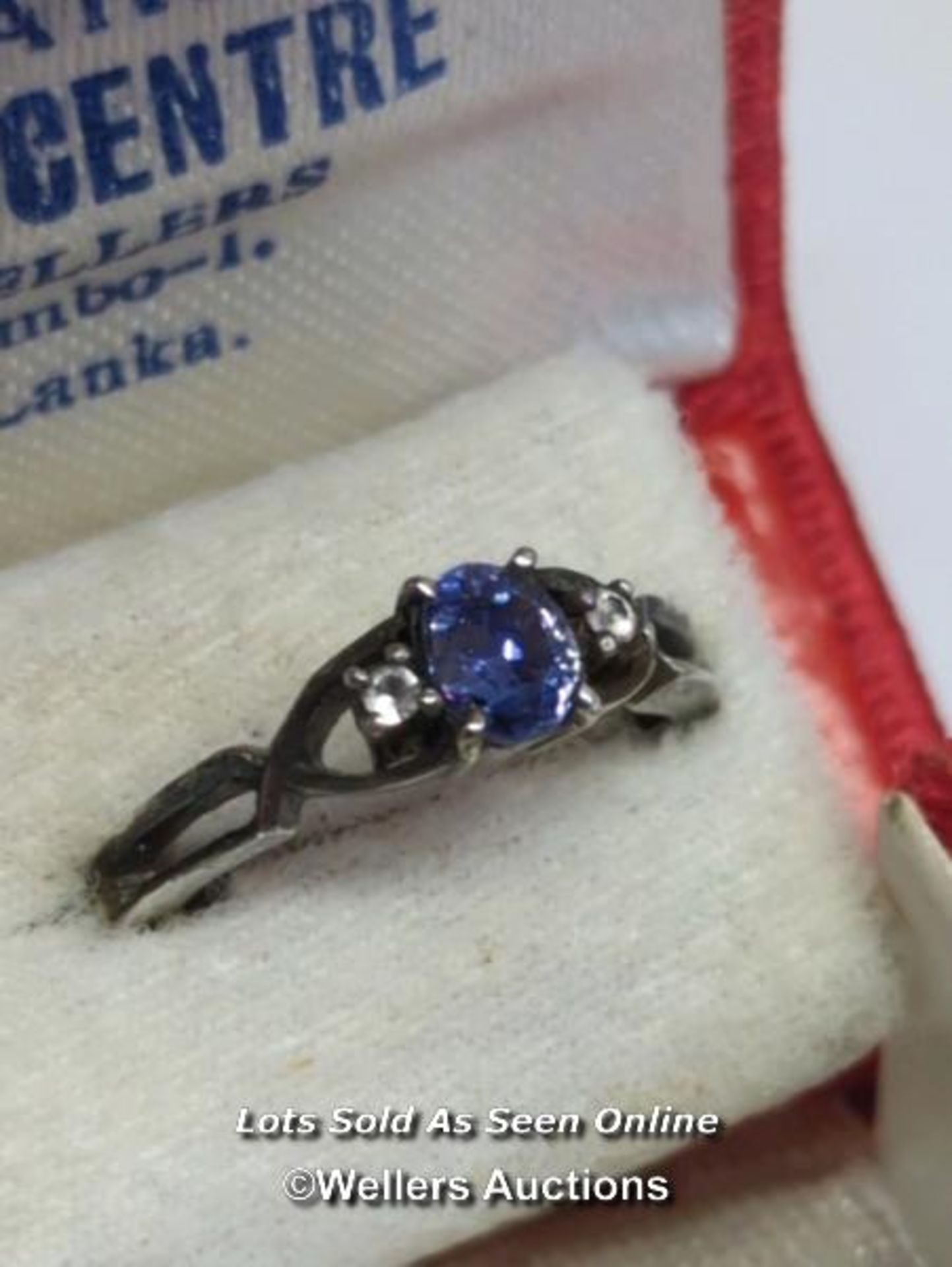 Oval sapphire and white sapphire ring in unmarked white metal testing as silver, ring size M, with a - Image 2 of 4