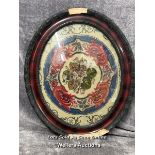 An oval floral tapestry in wooden frame (damaged), 54x63cm