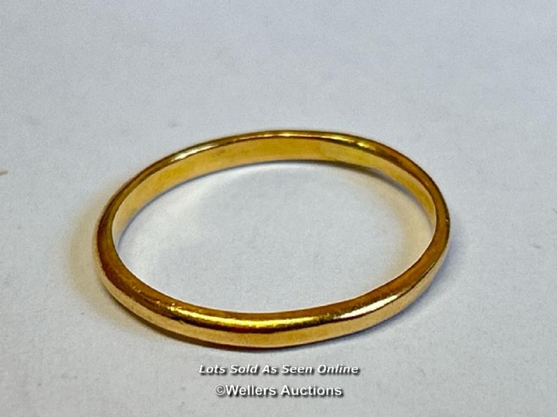 Wedding band, hallmarked rubbed, acid tests as 22ct gold, ring size Q. Gross weight 2.32g