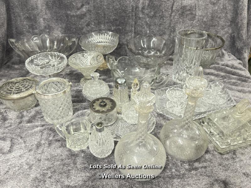 A large collection of glassware including decanters, bowls, vase, rose bowl and cheese dish / AN11