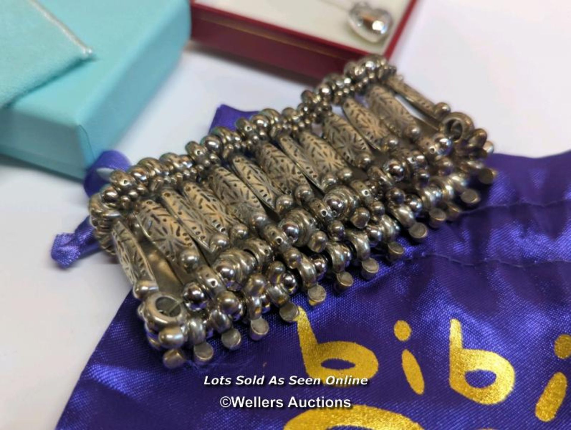 A Tiffany silver pen, hallmarked London 2007, a metal expanding bracelet by Bibi, a Swarovski - Image 6 of 8