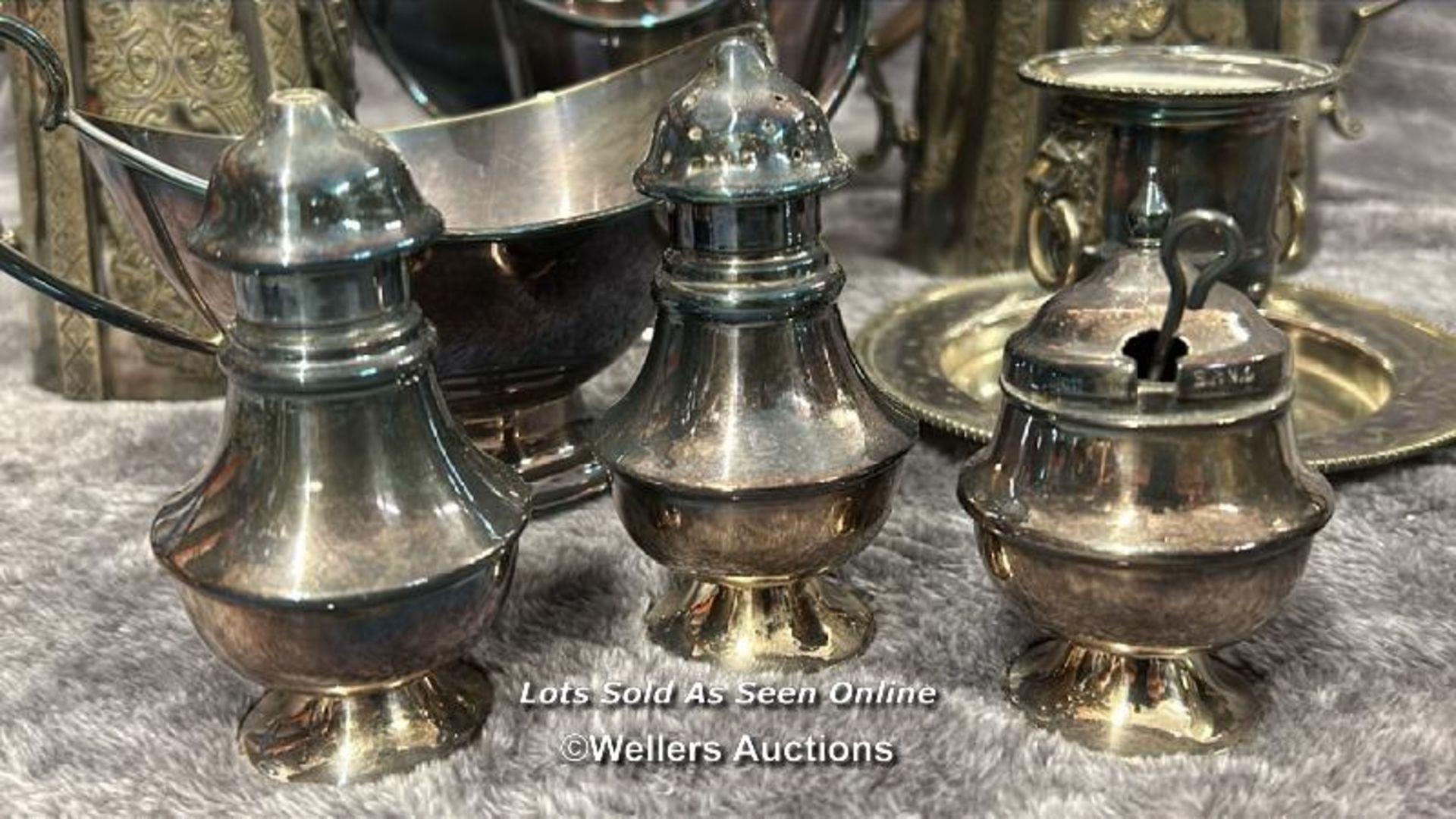 A large collection of antique metal plated items including a three armed candelabra, goblets, - Image 8 of 17