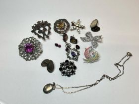 Quantity of costume jewellery including silver locket and chain, silver hallmarked brooches, paste