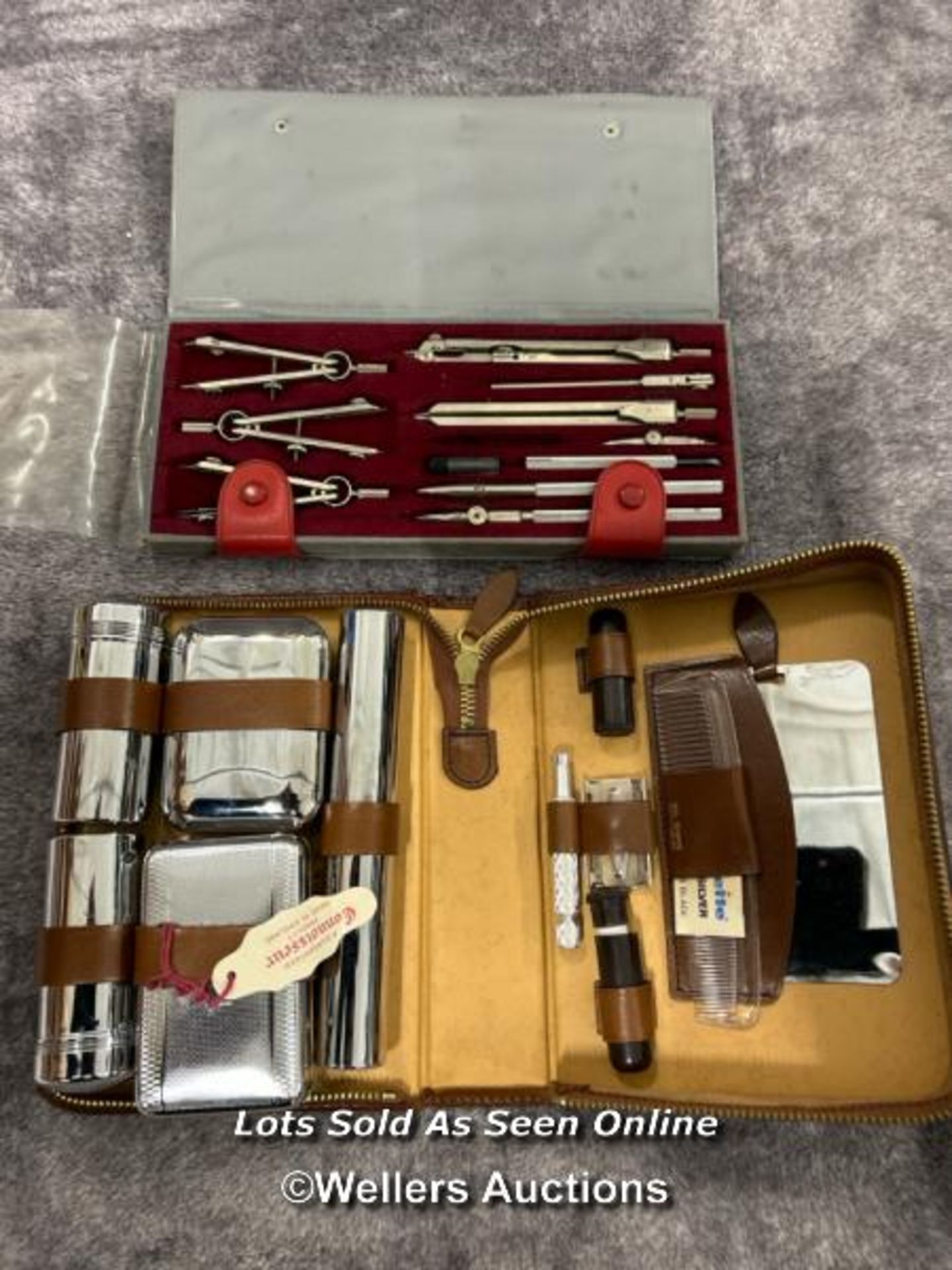 An unused travelling motoring vanity grooming set by Connoisseur and cased technical drawing set /