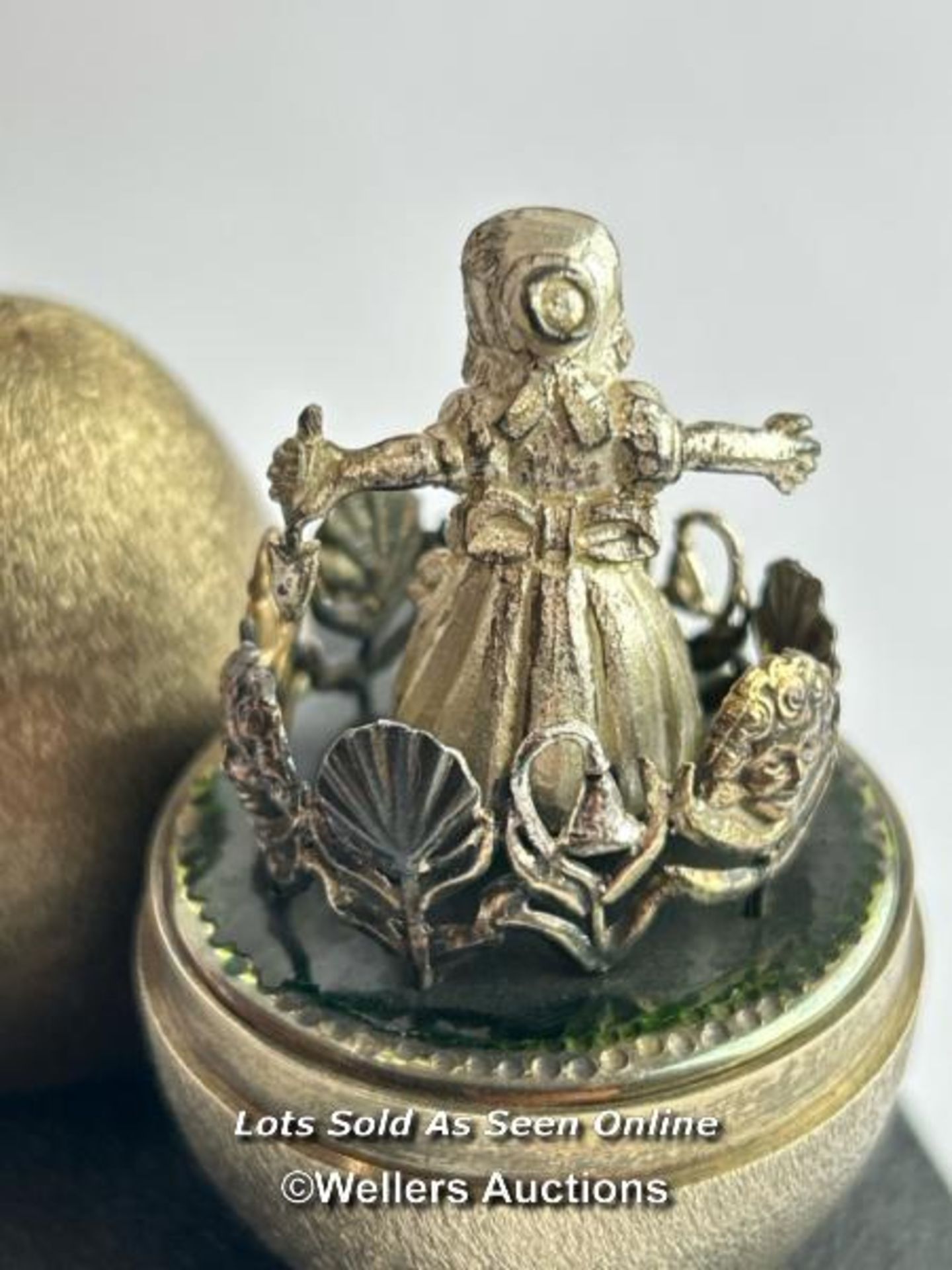 A hallmarked silver gilt egg Stuart Devlin, London 1973, nursery rhyme collection. Opening to reveal - Image 2 of 5