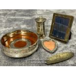 A selection of hallmarked silver items, including pepper grinder, heart shaped frame, dish and