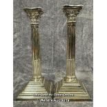 A pair of sterling silver candle holders in collumn form, hallmarks attributed to A Taite & Sons