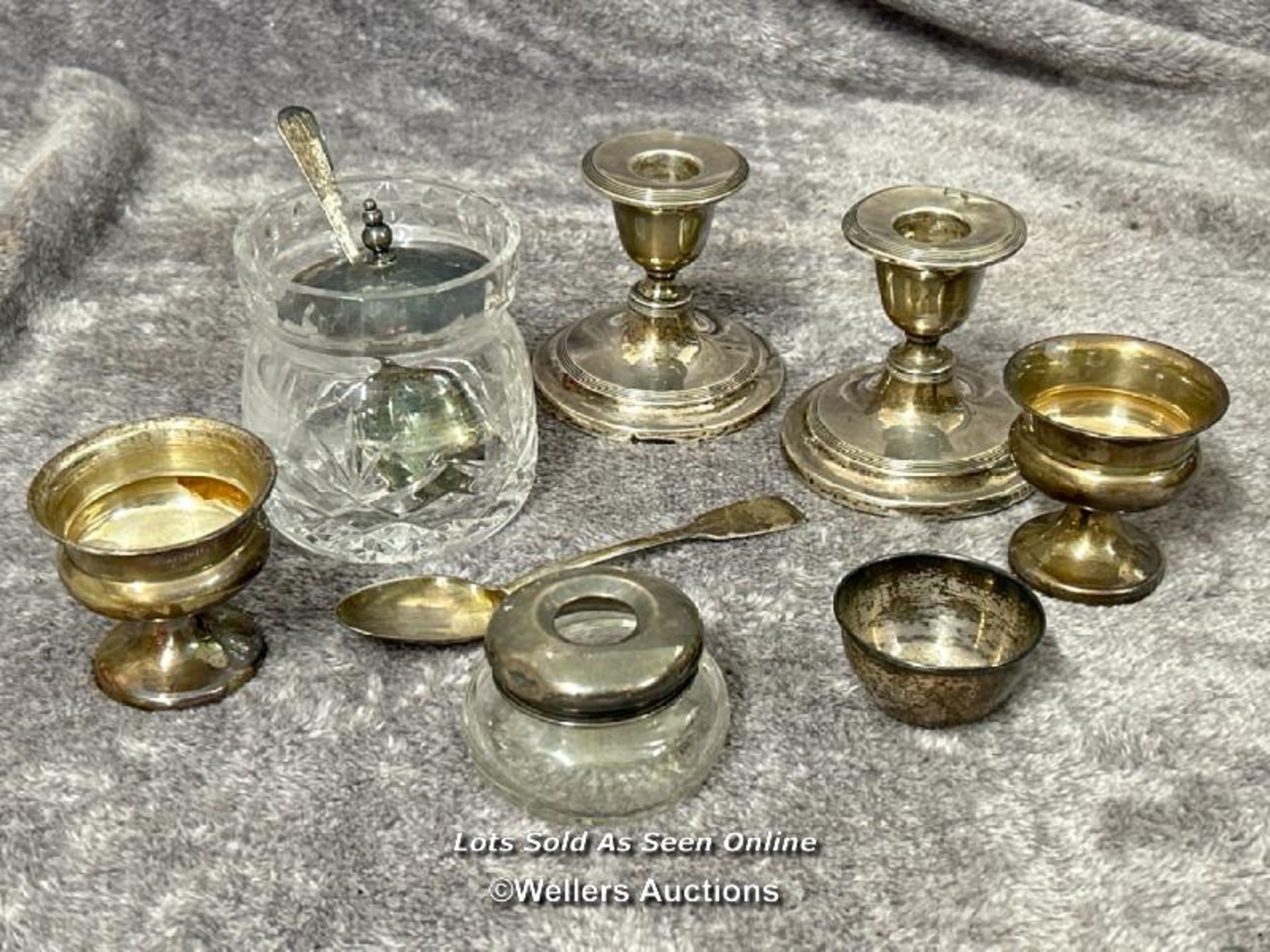 Quantity of silver : A pair of short candlesticks, hallmarked Birmingham 1907, a crystal jam pot