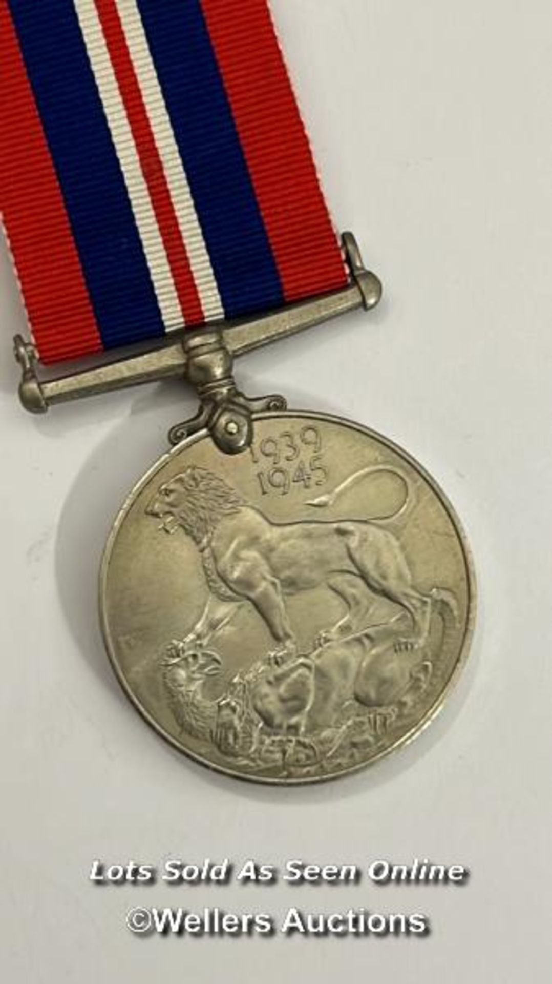 Four medals including the Italy star and the 1939-1945 star with a military cap badge stamped Silver - Image 7 of 13