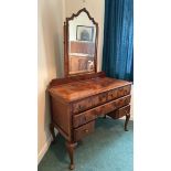 A five drawer walnut dressing table with bevelled mirror, 107 x 78.5 x 50cm, mirror 80cm (collection