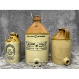 Three glazed stoneware bottles including a large vintage Yates Bros Mineral Water bottle, 43cm high,