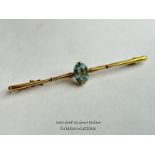 A boxed 15ct gold bar brooch set with a single aquamarine, 6cm wide / SF