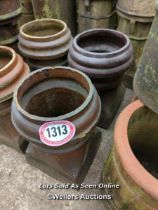 *A NEAR A PAIR OF SALT GLAZED CHIMNEY POTS, TALLEST 49CM (H)