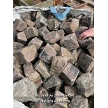 *A TONNE BAG OF RED GRANITE SETTS