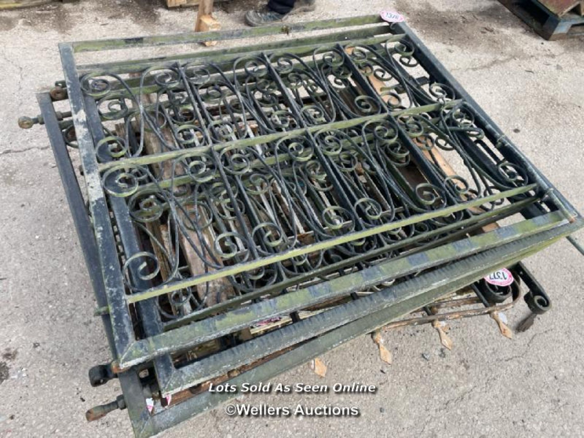 *A PAIR OF WROUGHT IRON GATES WITH ONE EXTRA GATE, 110CM (H) X 141CM (W) EACH