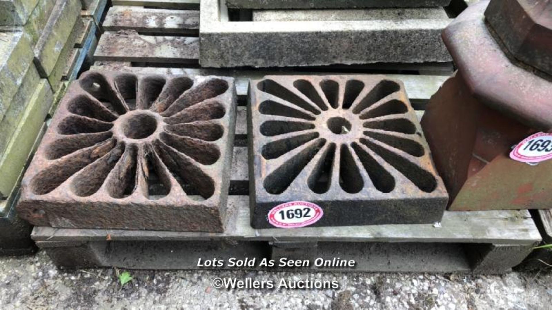 *A VERY SIMILAR A PAIR OF DECORATIVE CAST IRON GRATES, 8CM (H) X 37CM SQUARED