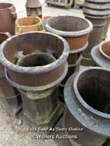 *A NEAR A PAIR OF SALT GLAZED CHIMNEY POTS, 85CM (H)