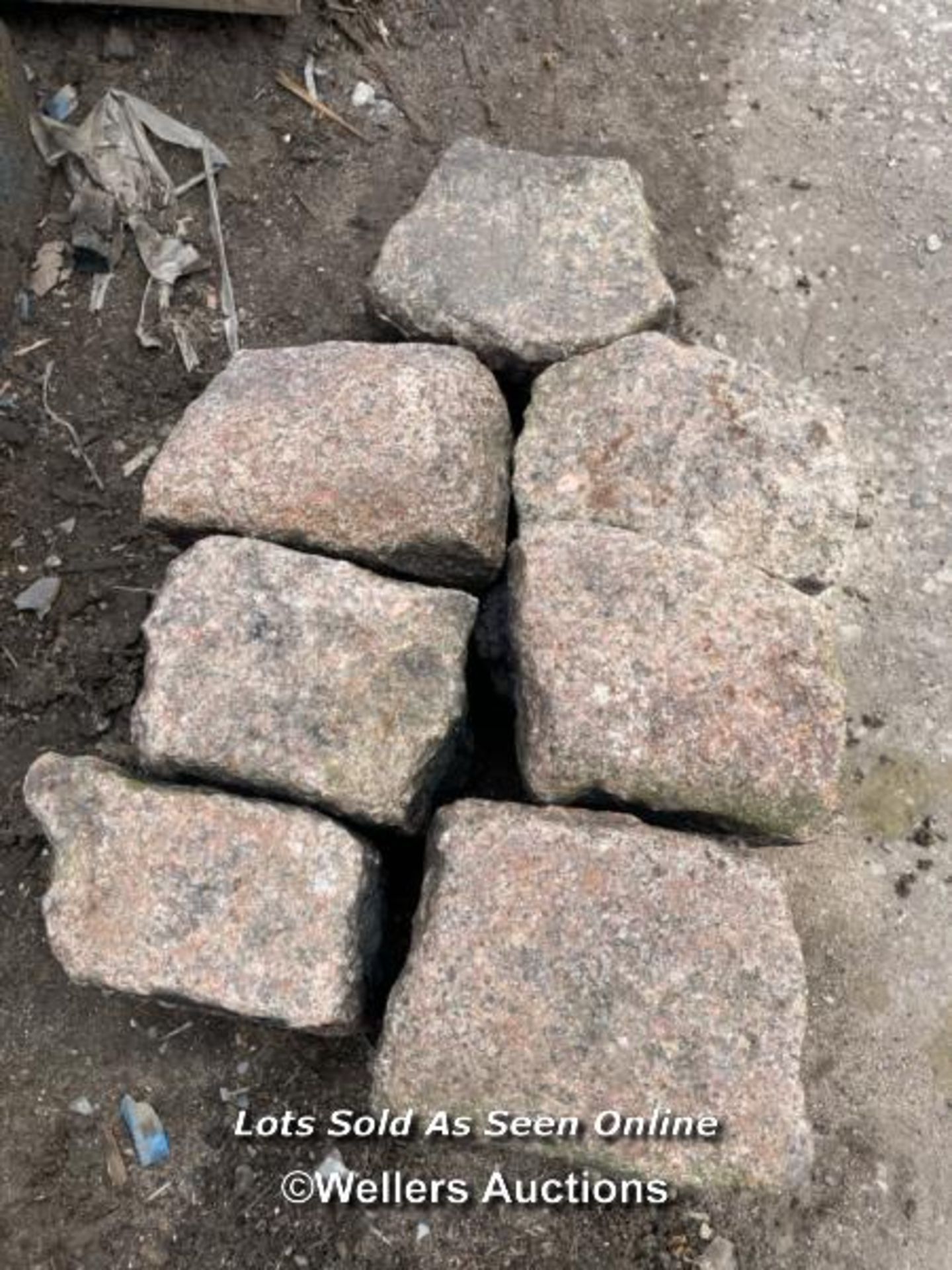 *A TONNE BAG OF RED GRANITE SETTS