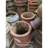 *A PAIR OF TERRACOTTA COLUMN STYLE CHIMNEY POTS, 47CM (H)