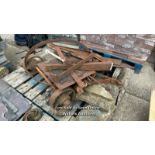 *PALLET OF MOSTLY CAST AND WROUGHT IRONMONGERY, INCLUDING SOME PIECES OF STONE