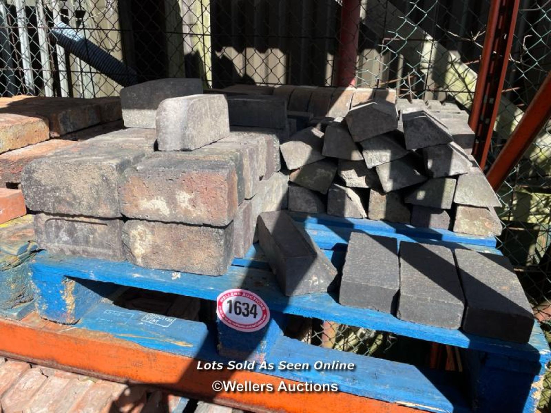 *PALLET FULL OF ASSORTED BLUE BRICK COPING AND CURVED BRICKS, VARIOUS SIZES