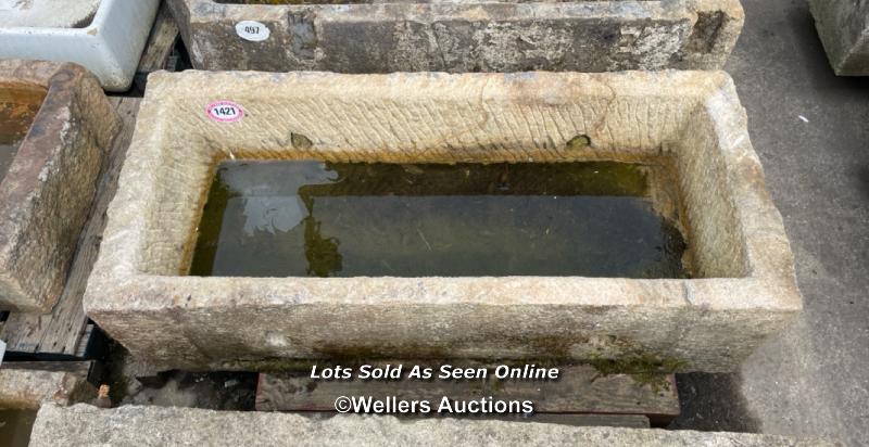 *A LARGE GRITSTONE QUARRY TROUGH, 45CM (H) X 170CM (L) X 76CM (W)