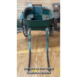 *A VINTAGE TWO MAN HORSE CART WITH GREEN LEATHER CUSHIONED SEATING AND BACKREST, ON TWO WHEELS