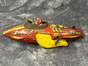 A Rex Mars tinplate wind up Rocket Fighter, in need of restoration, wind up mechanism not working,