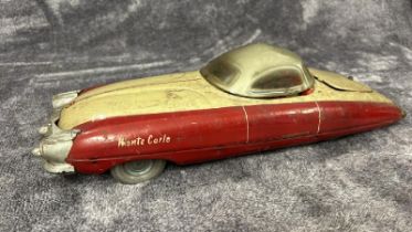 A rare Mettoy Monte Carlo Tinplate Futuristic Car, in need of restoration, missing friction motor,