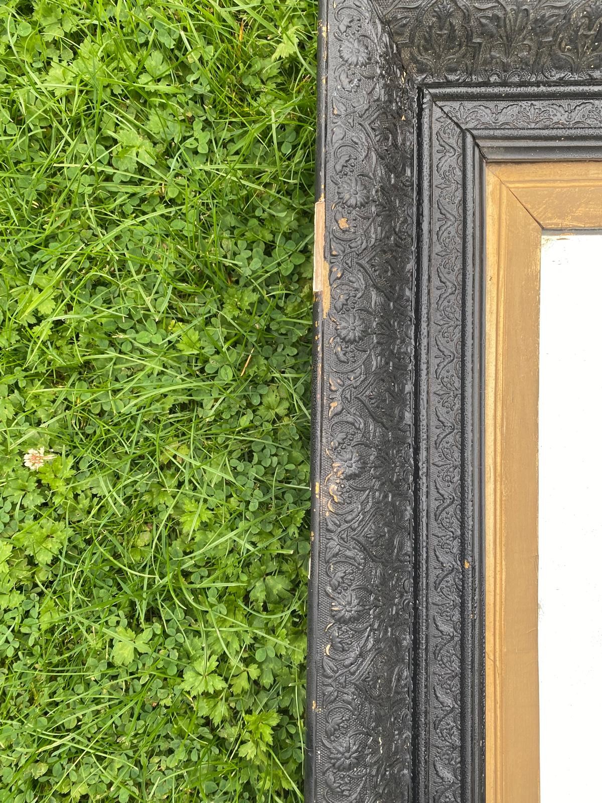 A large ebonised and gilt framed mirror with original plate / All lots are located at The Barn, - Image 3 of 5