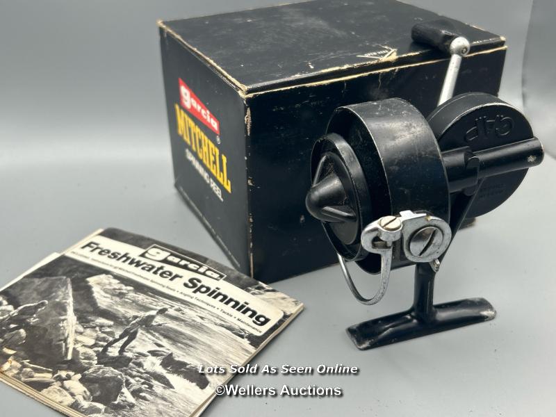 Garcia Mitchell fixed spool reel model 304 , with half bale arm and box