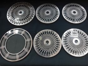 A COLLECTION OF 6 HM SILVER COASTERS