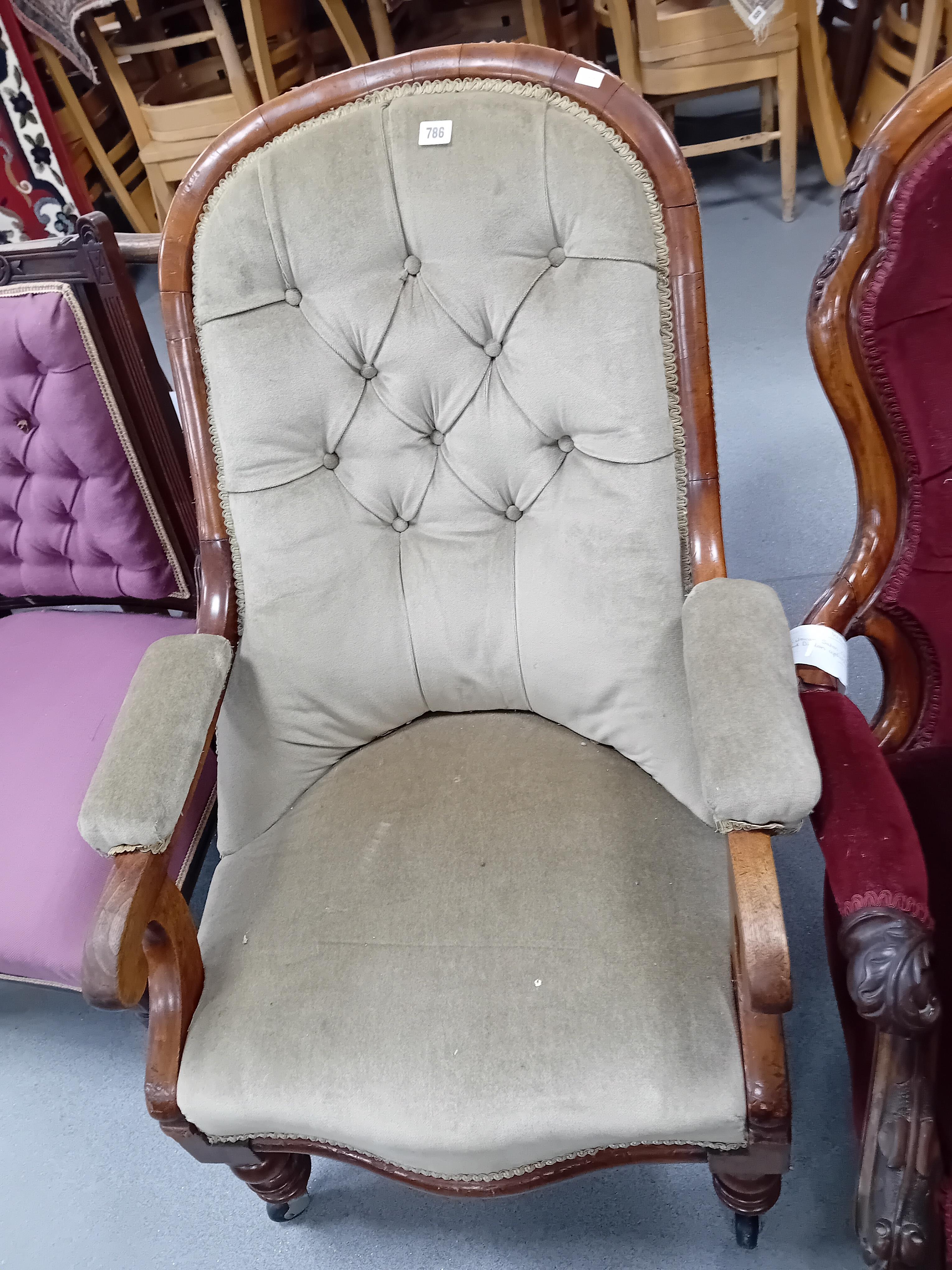 EARLY VICTORIAN ROUND BACK ARM CHAIR