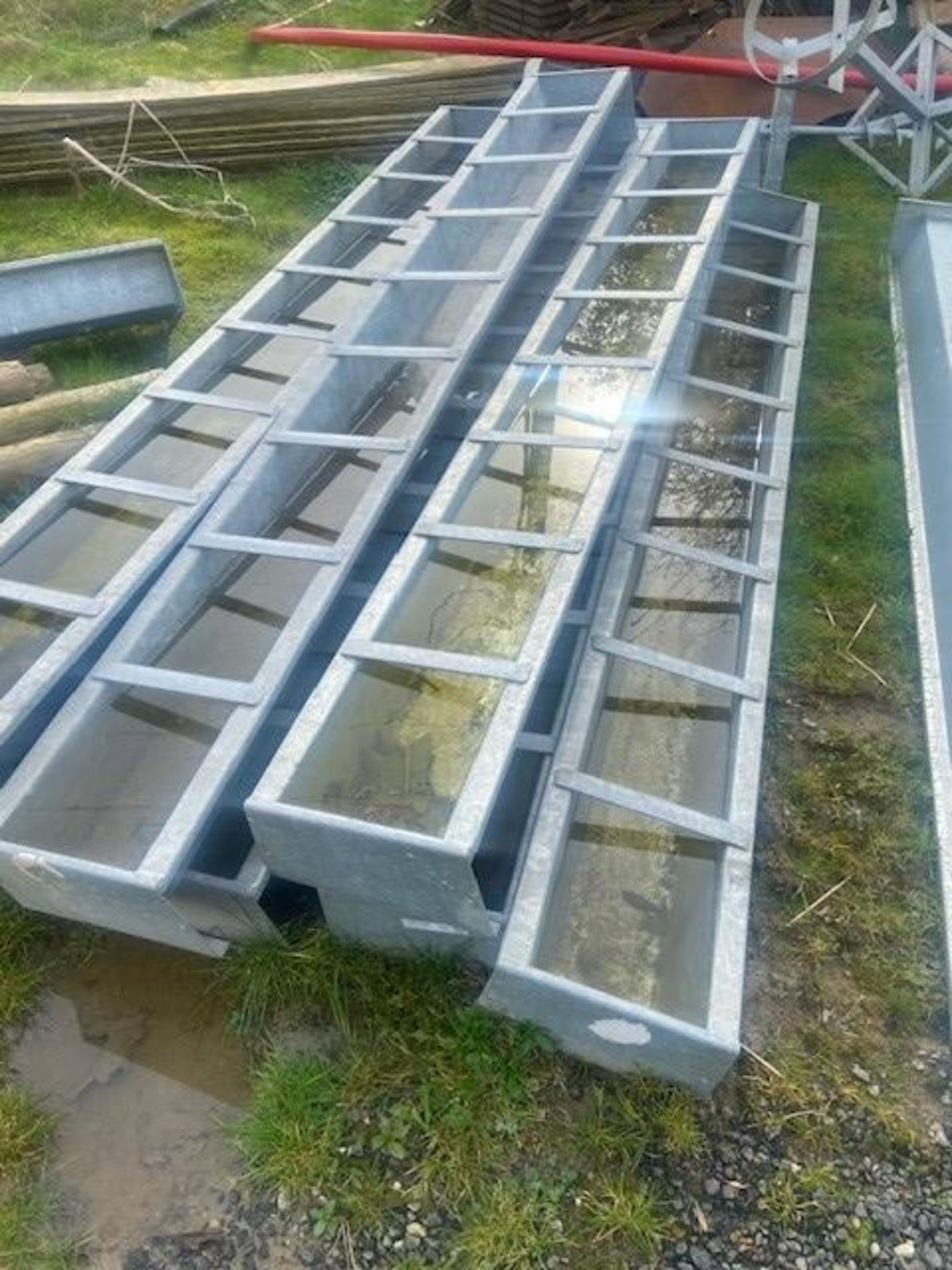 4 FEED TROUGHS, 9FT AS NEW