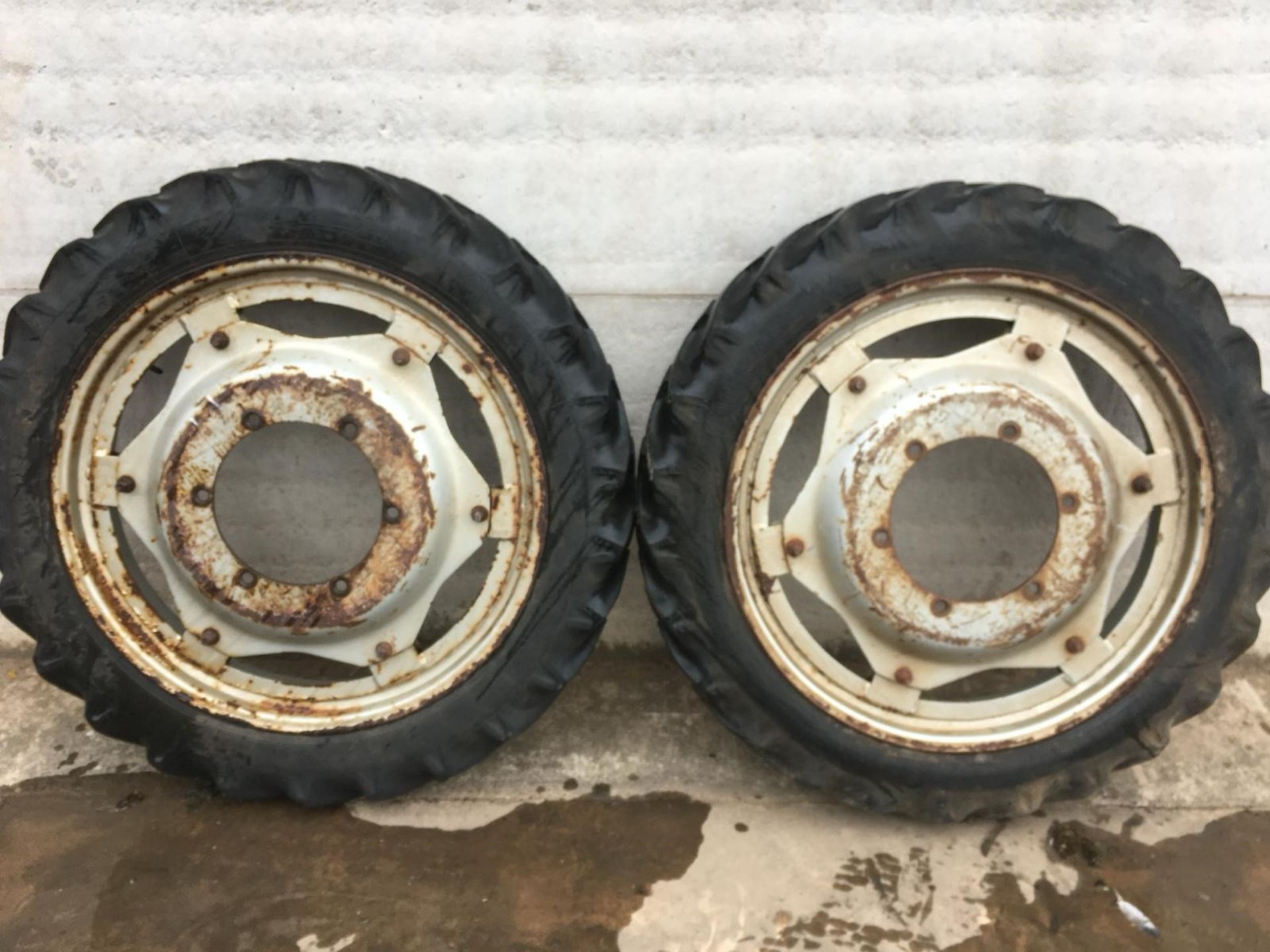 MF TRACTOR 8.3 X 32 ROW CROP WHEELS. IN GOOD CONDITION
