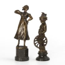 2 Bronze-Statuetten: Junge Bäuerin und Putto-Allegorie des Handwerks.