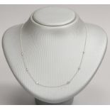 Halskette, 585 WG (gest.), mit 6x kl. Brill./zus. ca. 0,22 ct; L&auml;nge 44 cm, Gew. 2,30 g