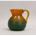 Glaskrug, bauchige Form mit kon. Hals, orange-grüne Aufschmelzung, Entw. Georges de Feure
