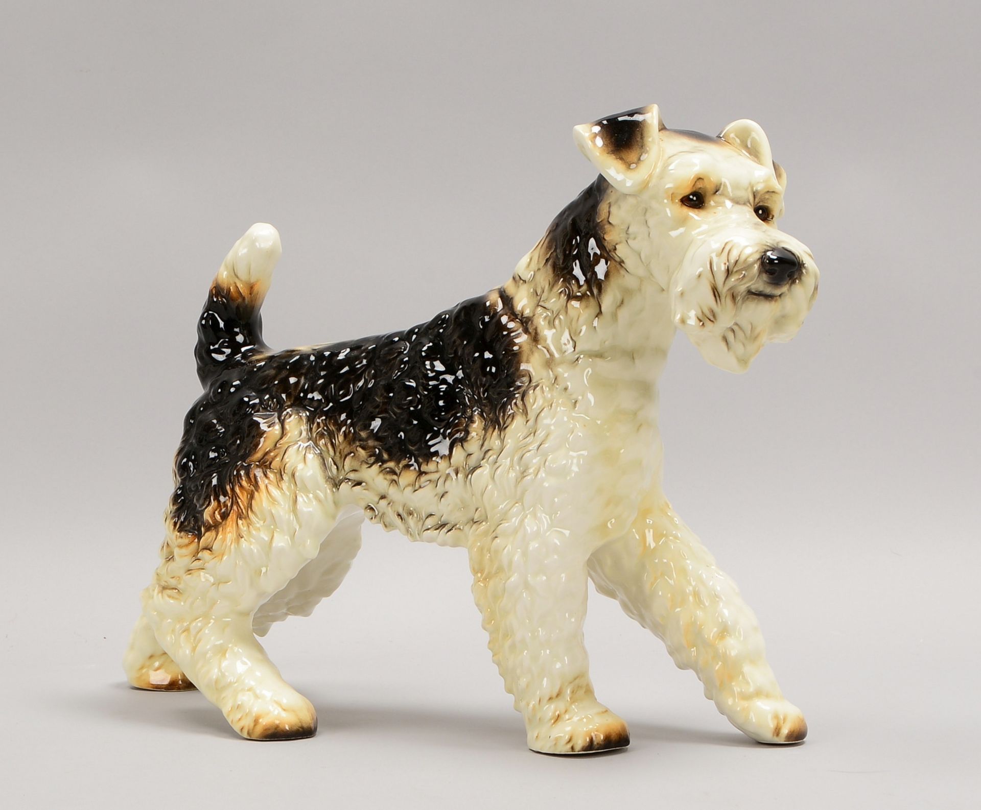 Goebel, Porzellanfigur, &#039;Terrier&#039;, farbig staffiert; Ma&szlig;e 29 x 40 cm