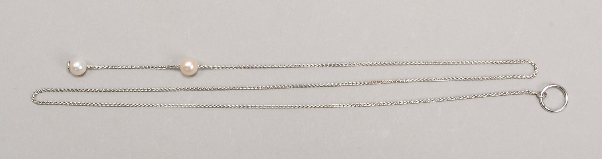 Halskette, 585 WG (gepr.), mit 2-fachem Perlenbesatz; Länge 49 cm, Gew. 3,20 g