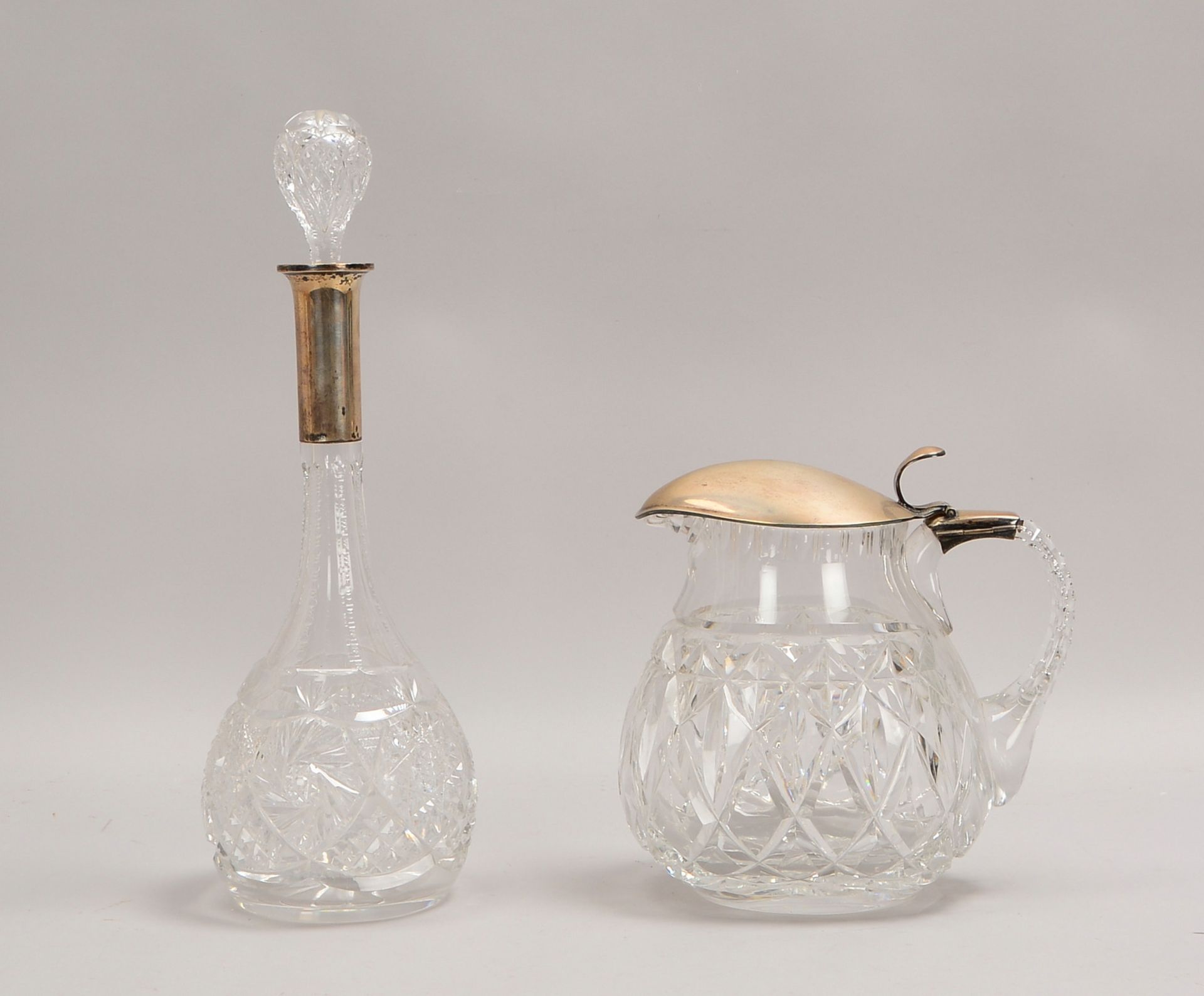 Kristall-Karaffe und Schenkkanne, geschl. Glas, mit 800 Silber-Montierung
