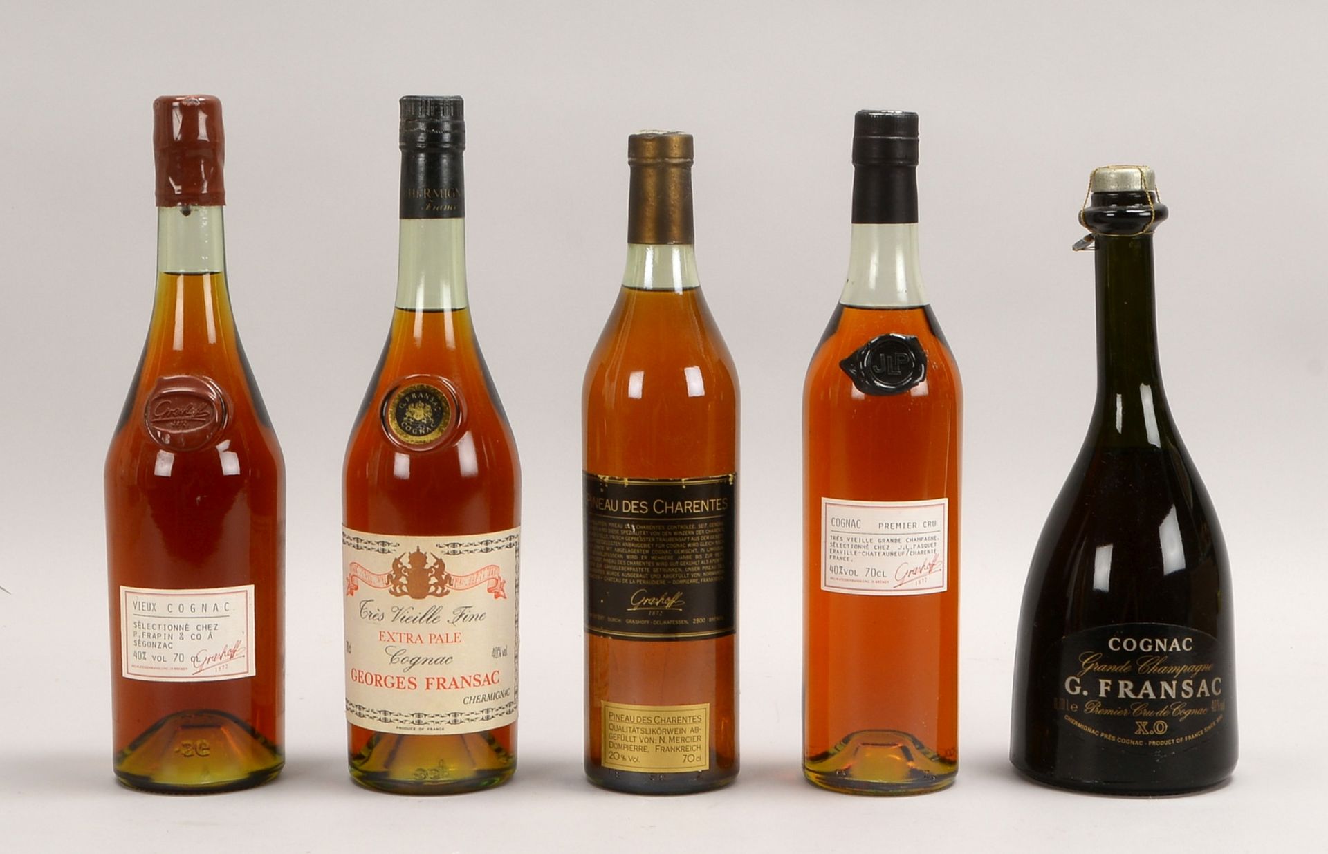 Sammler-Spirituosen, 5 Flaschen: Cognac Georges Fransac, und Grashoff-Cognac 