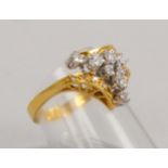 Ring, 585 GG (gest.), mit 22x Diam./zus. 0,55 ct, Achtkant- und Brillantschliff; Gew. 4,40 g