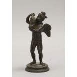 Kleine Bronzefigur, 'Geflügelter Jüngling mit Delfin', unsigniert/ungemarkt; Höhe 12 cm