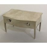 A novelty silver hinged box in the form of a table.