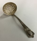 An unusual Georgian silver berry spoon with pierced bowl.